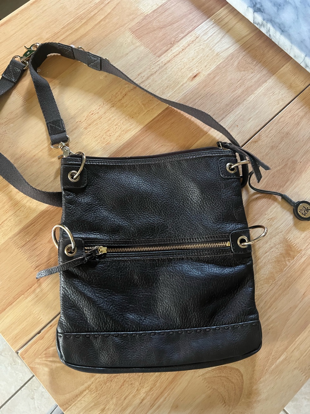 The SAK Brown Leather Crossbody Bag with Gold Accents